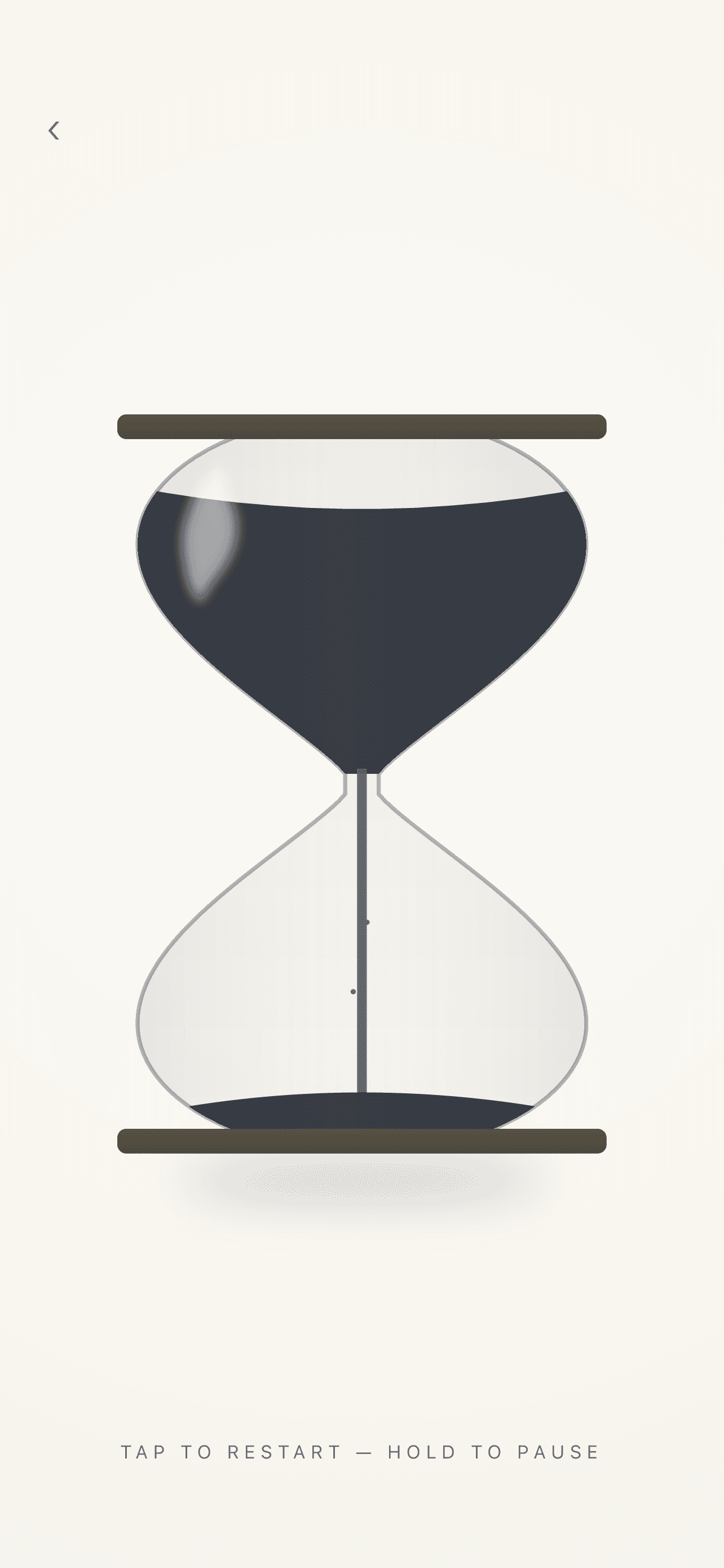 Hourglass timer showing sand falling through the glass